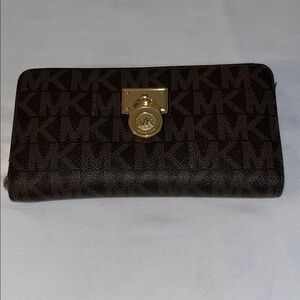 Michael Kors Dark Brown Wallet with Gold Hardware used good condition
